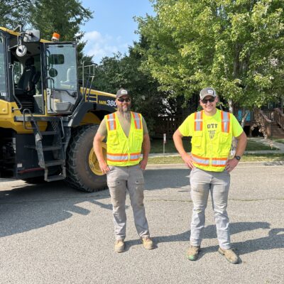 Construction fellas cheesin’ for the camera at AEOA’s 4th Annual Block Party hosted at the agency’s offices in Virginia on Thursday, July 23, 2026.