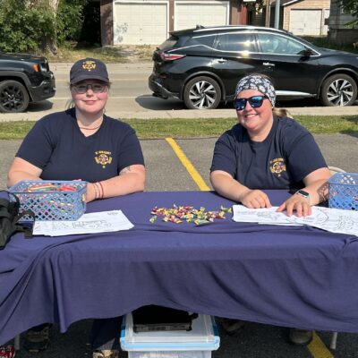 St. Louis County Sheriff Rescue set up to chat with visitors at AEOA’s block party.