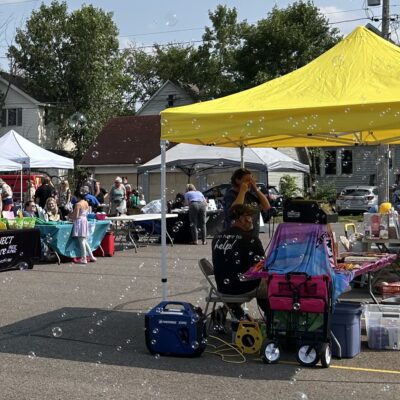 Bubbles blew in a light breeze through the AEOA parking lot while neighbors mingled during the agency’s 4th Annual Block Party in Virginia on Thursday, July 23, 20206.
