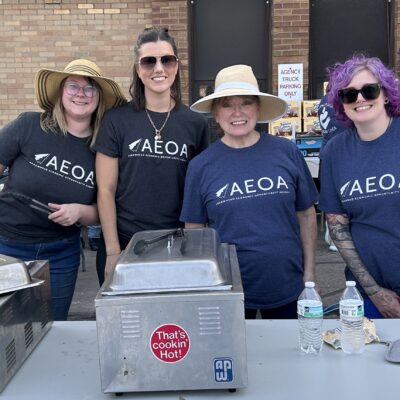 AEOA Senior & Nutrition staff Aubrey Zgonc, Lindsay Thompson, Marilyn Ocepek and Sarah Kumfer served a barbecue-style dinner during the agency’s annual block party on Thursday, July 23, 2026.