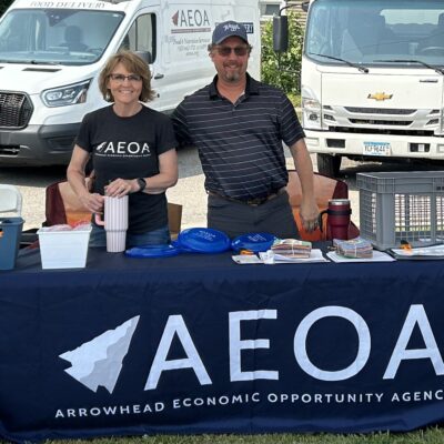 AEOA Senior Services Manager Jill Clapsaddle and helper Herb are ready to chat with community members at the agency’s block party on Thursday, July 23, 2026.